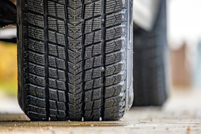 closeup-of-parked-car-on-a-city-street-side-with-n-2023-11-27-05-03-54-utc (1)